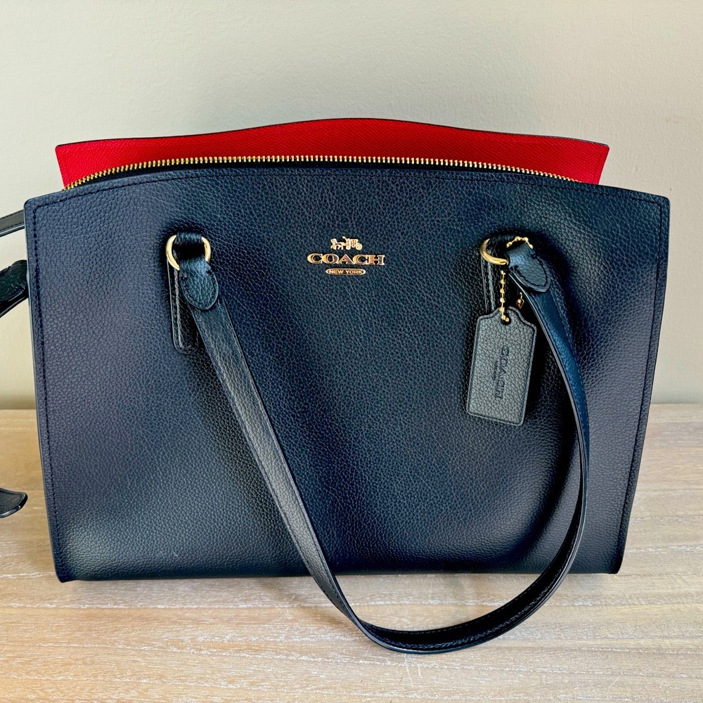 Black Coach bag with Gold tone hardware.